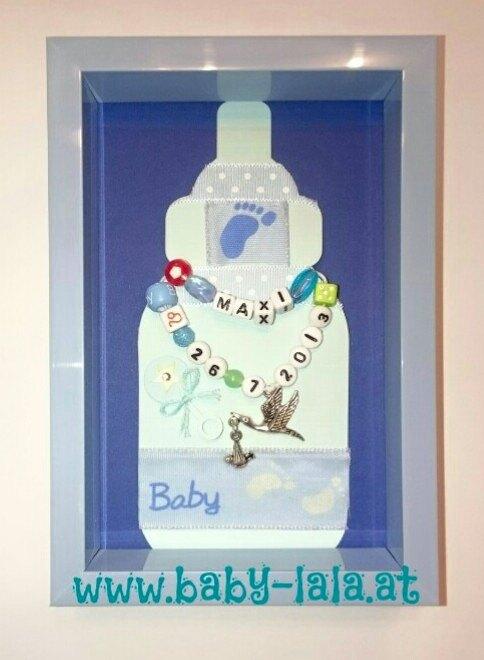 Geburtsbild Babyflasche mit Babyname und Geburtdatum im Bilderrahmen